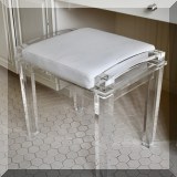 F26. Lucite and leather vanity stool. 19”h x 20”w x 21”d 